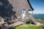 BBQ and small deck with ocean views. Please note the stairs to access the house could be an issue for people with mobility issues. 